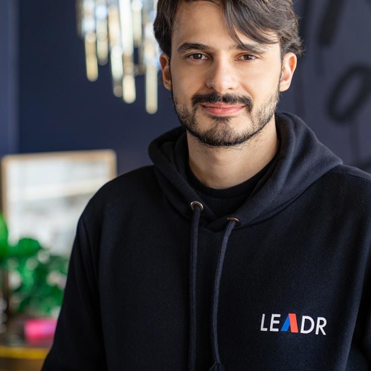 Arin Kapoor, Client Relations Director, discussing corporate gifting strategy with business clients